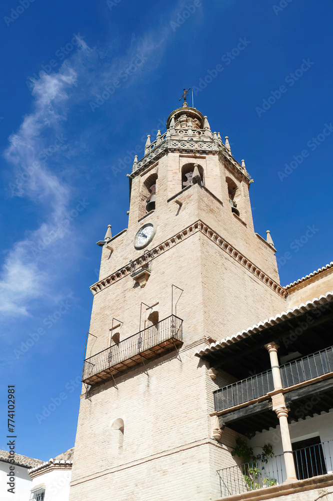 Vertical shot of the bell tower of the Santa Maria la Mayor cathedral in Ronda Spain