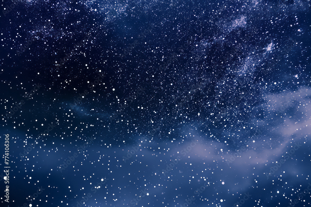 A dark night sky adorned with twinkling stars and drifting clouds
