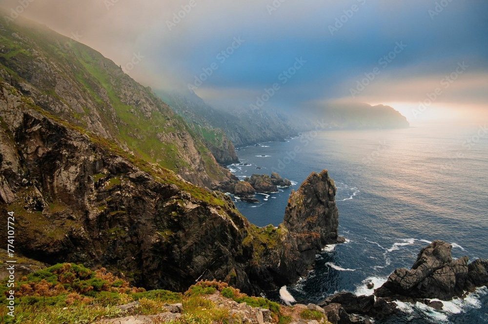 Landscape View from the lighthouse of Cabo Ortegal in Galicia, Spain during a stormy sunset