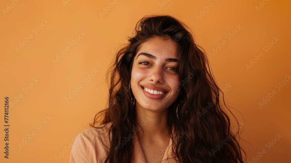 Joyful Skincare Portrait of Middle Eastern Model with Long Wavy Hair
Joyful Skincare Portrait of Middle Eastern Model with Long Wavy Hair