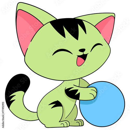 green cat happily playing with ball