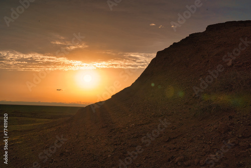 The Desert Beyond the Horizon as the Sun Sets