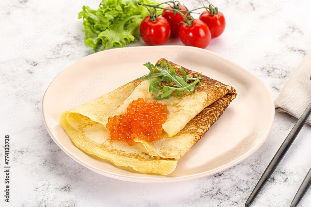 Russian pancake with red caviar Russian pancake with red caviar