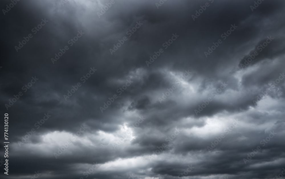 dark clouds make sky in black. Heavy rain thunderstorm. Pattern of clouds overcast predict tornado, Hurricane or thunderstorm and rainy. Dark sky cloudy have storm and lightning thunderbolt. - obrazy, fototapety, plakaty 