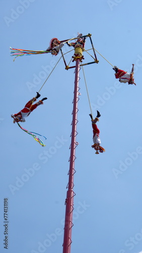 Voladores performing their aerial dance in Chapultepec Park in Mexico City, Mexico