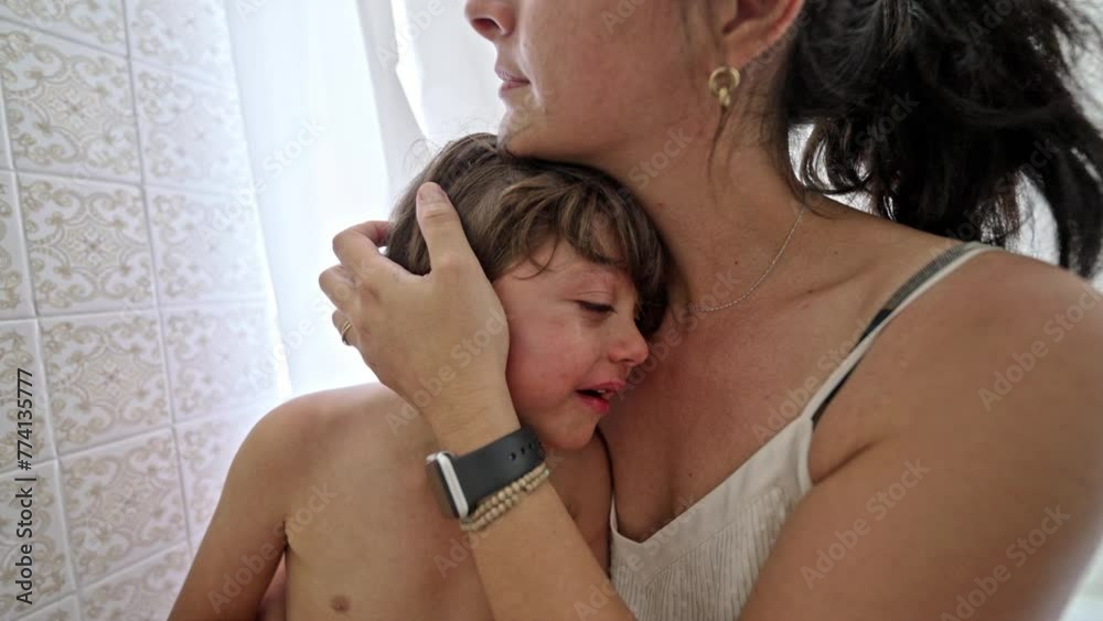 Mom Comforts Young Boy In Tears Following Injury