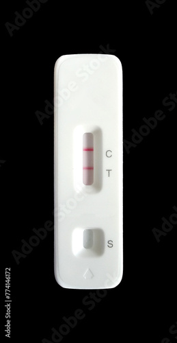 Rapid Antigen Test kit (ATK) show positive result band on black background.