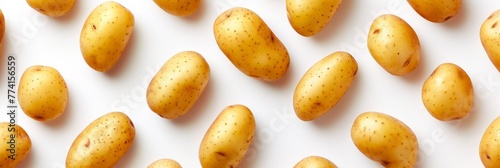 Pattern formed by potatoes against a white background