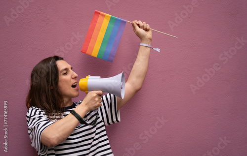 Transsexual woman fighting for LGBTQ community rights isolated on purple background with copy space