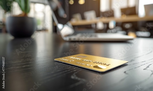 A gold credit card on a tab...