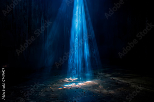 You shall have no other gods before Me. A single beam of light pierces through the darkness, symbolizing the divine revelation of the First Commandment photo
