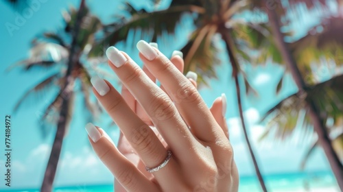 close-up of a hands with beach manicured nails
 photo