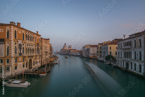 Long Exposure view of Grand Canal and Basilica Santa Maria della Salute seen from the Rialto Bridge on a hazy winter evening, Venice, Veneto, Italy