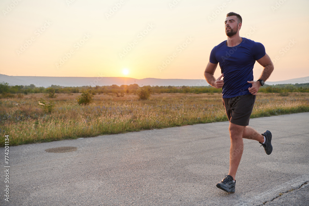 A dedicated marathon runner pushes himself to the limit in training. A dedicated marathon runner pushes himself to the limit in training.