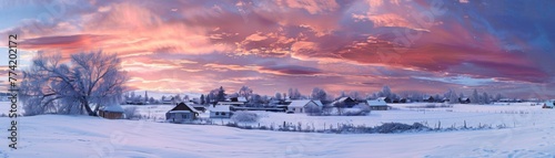 Cold morning sky streaked with pink and orange above a snowy village.