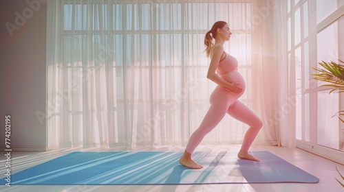 A pregnant woman does gymnastics.
