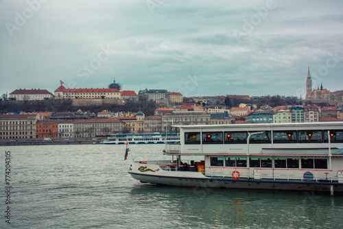 A ship on the Danube river with a view of the city