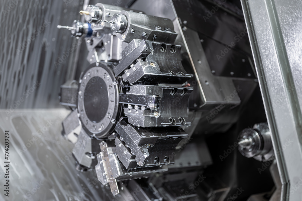 Industrial metalworking cutting process by cnc lathe machine. High quality photo Industrial metalworking cutting process by cnc lathe machine. High quality photo