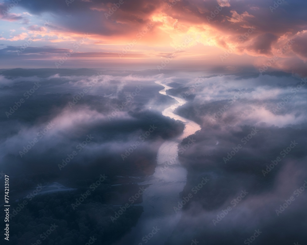 Wisps of fog dance over a river at dawn