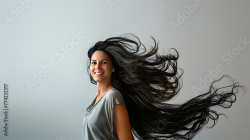Serene Woman with Flowing Hair in Gentle Breeze