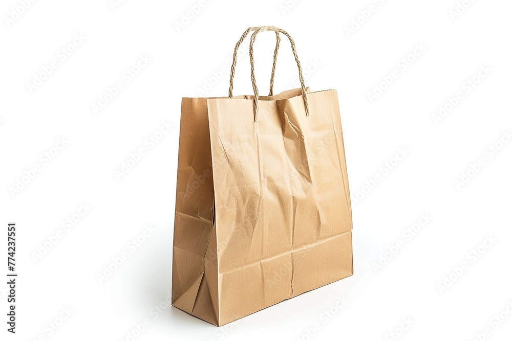 Paper shopping bag with handle on white background Paper shopping bag with handle on white background
