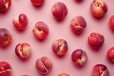 Pattern of ripe peaches on pink background