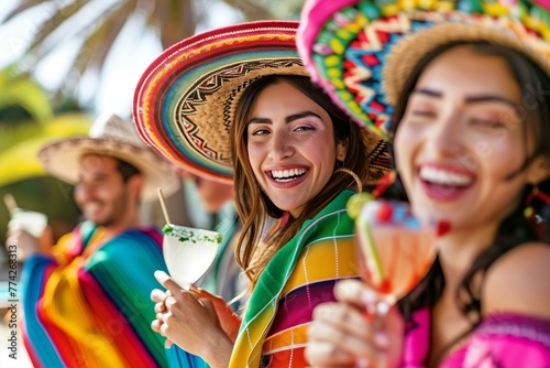 Group of Mexican friends wearing sombreros and vibrant ponchos, cheering with margaritas in a sunny backyard, embodying the spirit of Cinco de Mayo, bright and joyful expressions