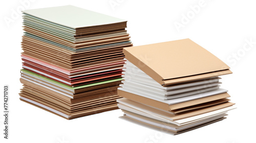 A vibrant stack of various colored papers arranged neatly on a white background