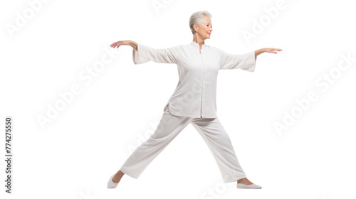 Woman in white outfit gracefully practicing yoga pose