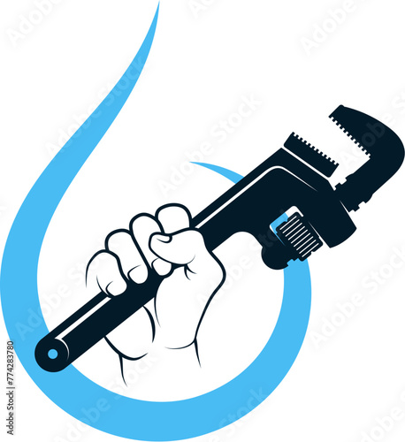 Water wrench in plumber's hand and drop of water