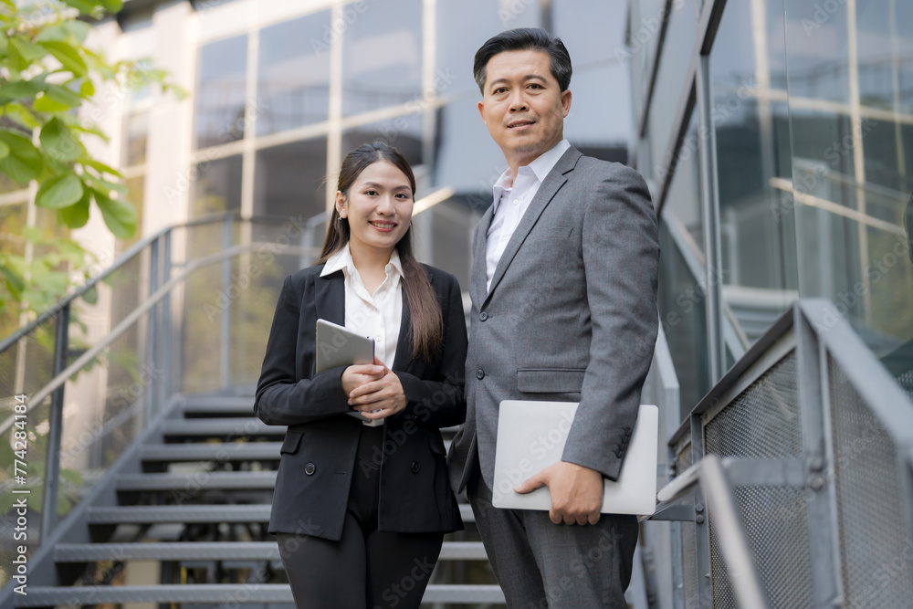 Professional business team on corporate stairway Professional business team on corporate stairway