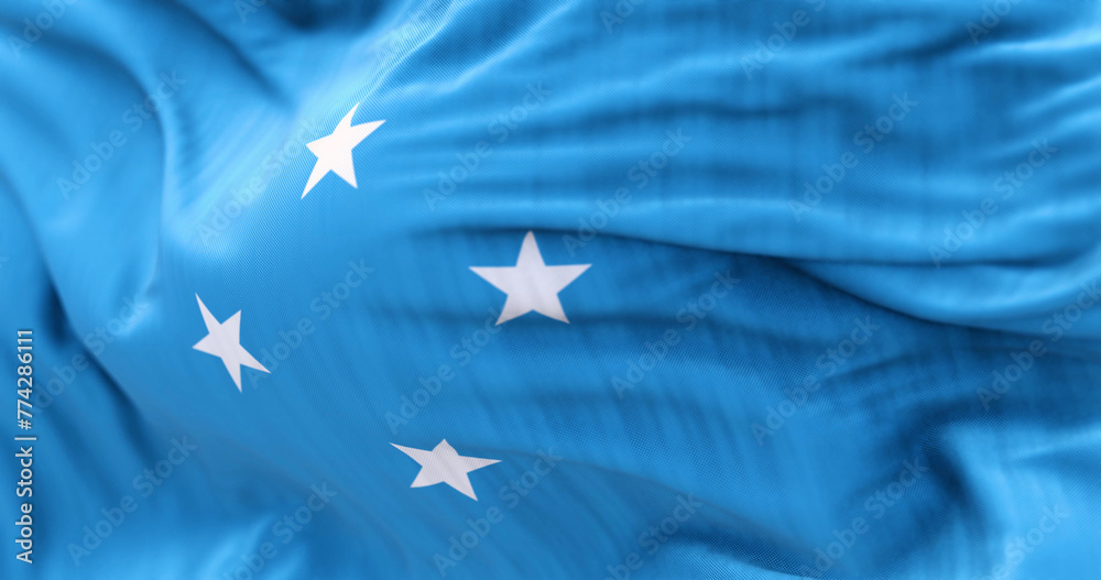 National flag of Federated states of Micronesia waving on a clear day - obrazy, fototapety, plakaty 