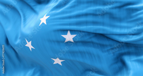 National flag of Federated states of Micronesia waving on a clear day photo