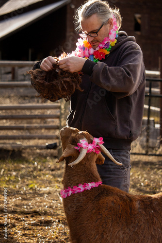 Vacation Farmer Man Wearing Flowers Holding Wig Gets Ready for Photoshoot
