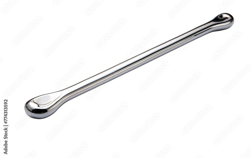 A gleaming metal spoon with a long handle resting gracefully on a pristine white background A gleaming metal spoon with a long handle resting gracefully on a pristine white background