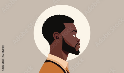 African American man with short hair and beard in profile