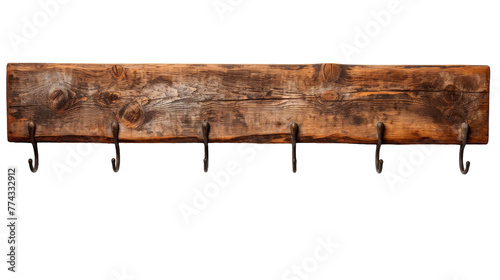 A wooden coat rack adorned with multiple hooks for hanging garments in a stylish and practical manner photo