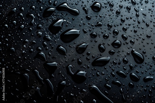 black background Water droplets on black background