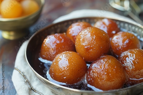 Gulab Jamun soaked in syrup photo