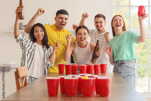 Group of young friends play...