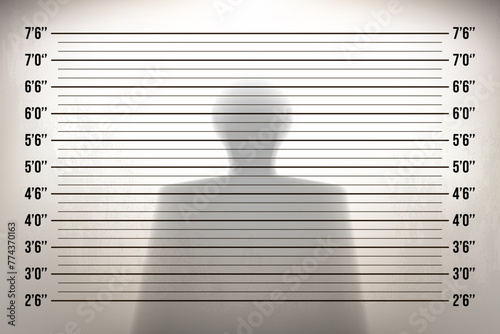 Mugshot in a police station with a shadow of man photo