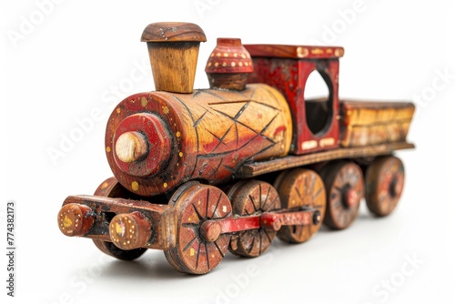 Antique toy train on white backdrop