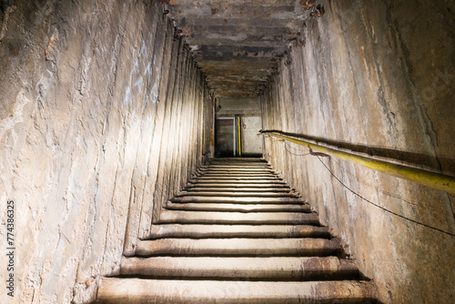 Dark underground staircase up to the entrance to mine © Pavlo Vakhrushev