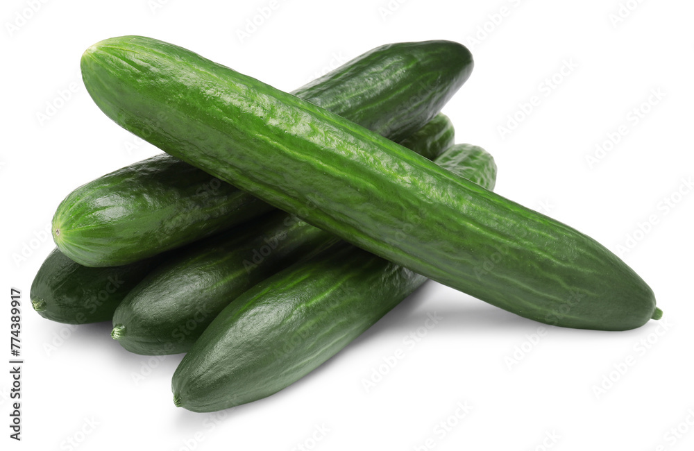 Many long fresh cucumbers isolated on white Many long fresh cucumbers isolated on white