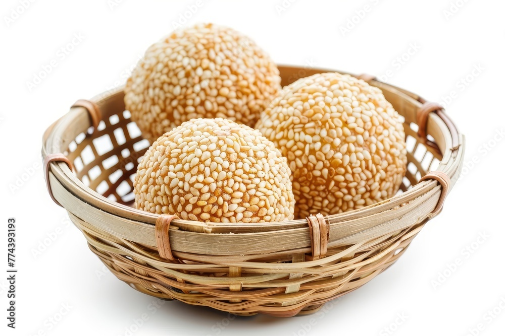 Asian sesame ball dessert in white basket