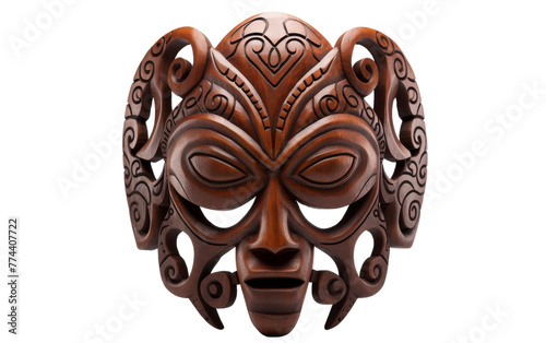 A wooden mask featuring elaborate and detailed designs etched into its surface