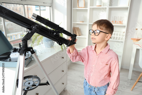 Cute little boy in eyeglass...