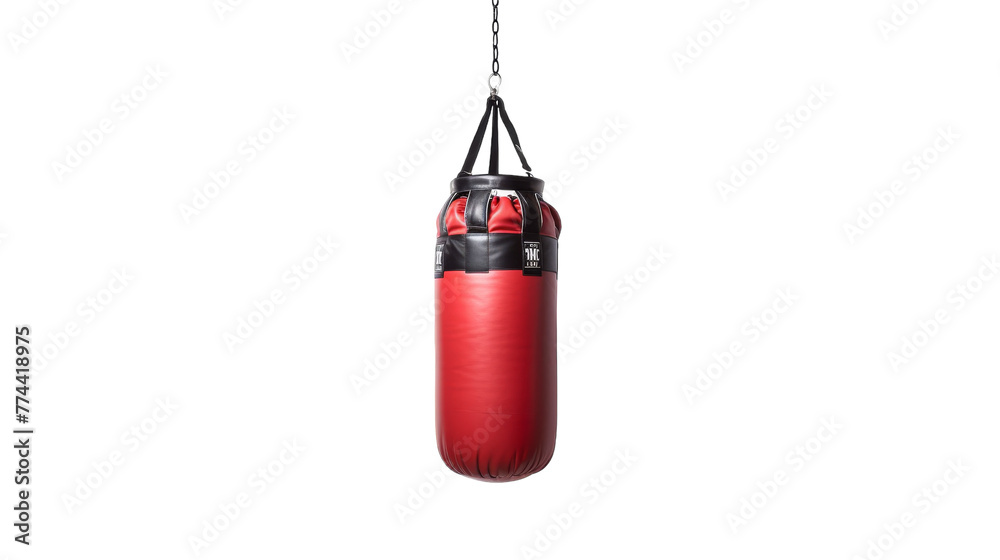 A red punching bag swings gracefully from a chain