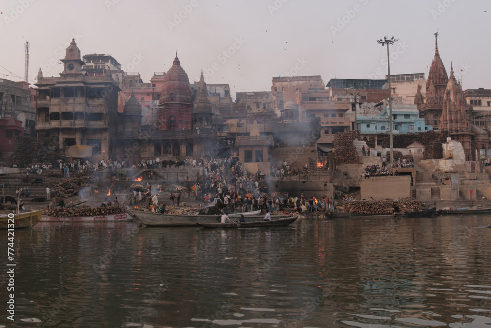 Fototapeta premium Varanasi Ganges Ghats Temples India Sacred Hinduism Pilgrimage Rituals Boat Sunrise Sunset Reflection Spiritual Culture Heritage Tourism Iconic Scenic Views River Asia