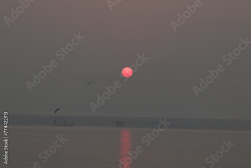 Boats Ganges Ganga River Varanasi Benares Uttar Pradesh India Water Transport Traditional Colorful Sunrise Culture Hinduism Sun Pollution Sunset Sacred City Tourism Scenic Views Iconic Ghats Temples